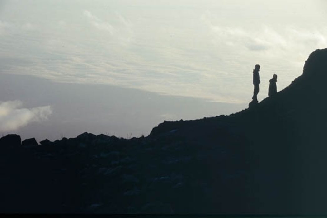 009 Silhouetted Figures On Mawenzi Ridge Watching The Sunrise Rongai Route Mawenzi Tarn Hut To Kibo