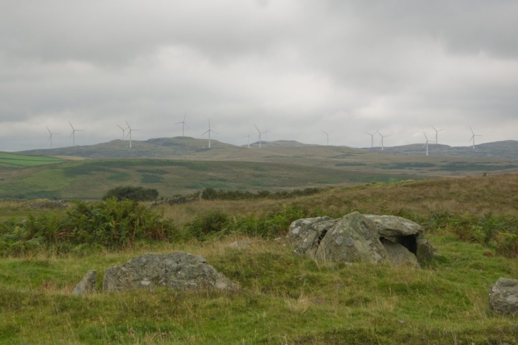 West not best: Caves of Kilhern chambered cairn, and the windfarm rising above (Stage 3)
