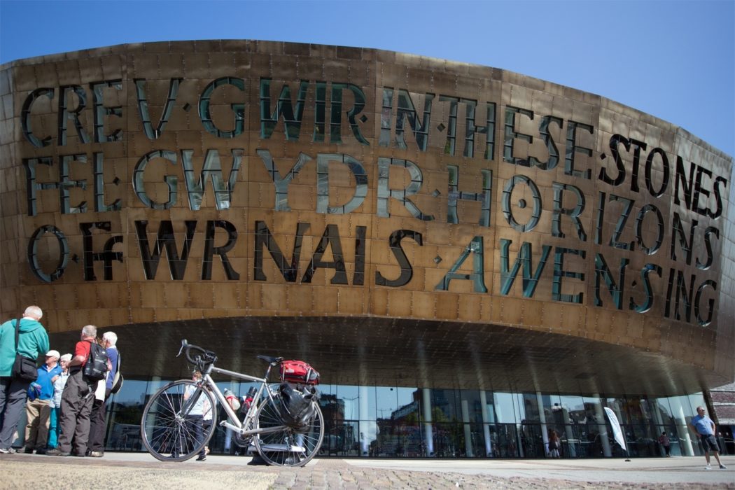 The impressive steel and copper front of Wales Millennium Centre (Canolfan Mileniwm Cymru) near the start of Lôn Las Cymru in Cardiff Bay