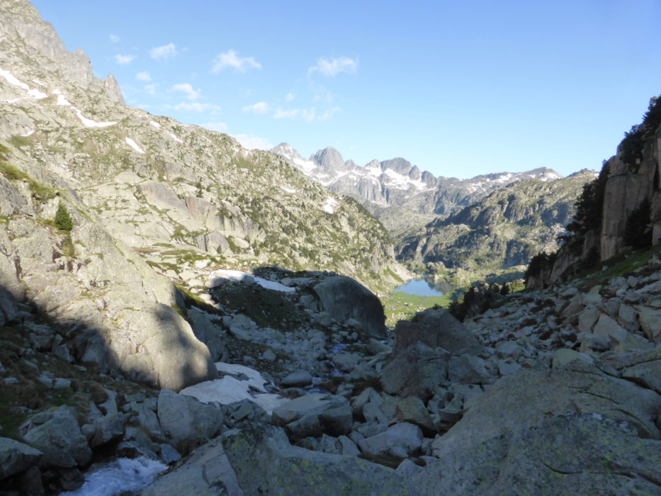 Climbing across boulders towards the Coll de Contraix