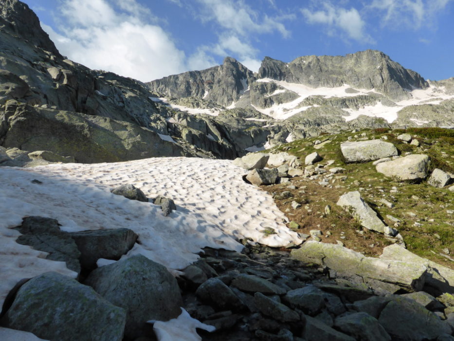 Snow patches climbing towards the Coll de Contraix