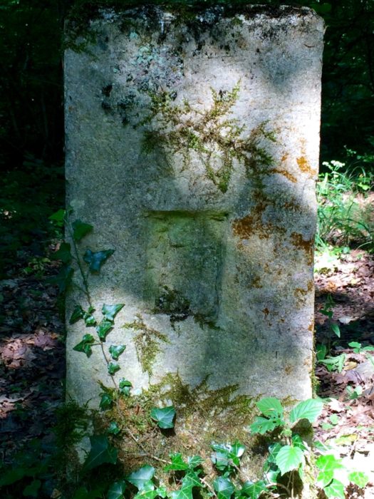 Eastern side of old border stone (with D for Deutschland effaced)