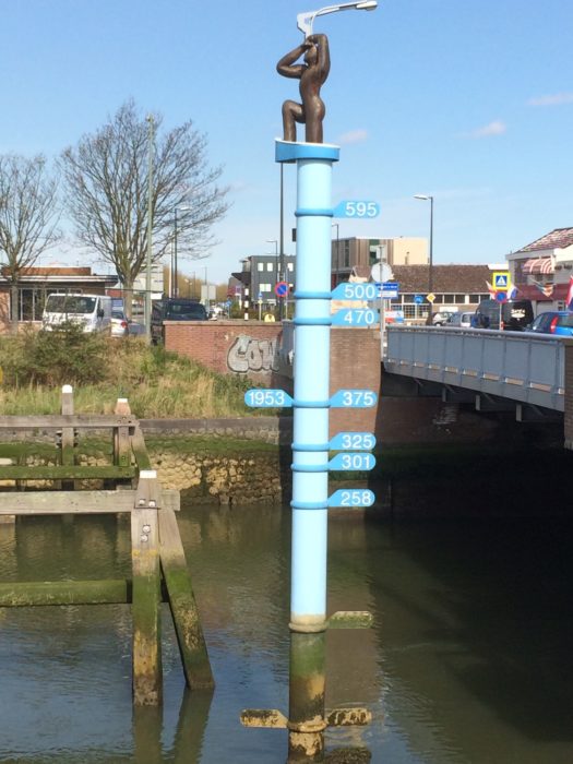 Monument in Maassluis showing the height of water during the floods of 1953