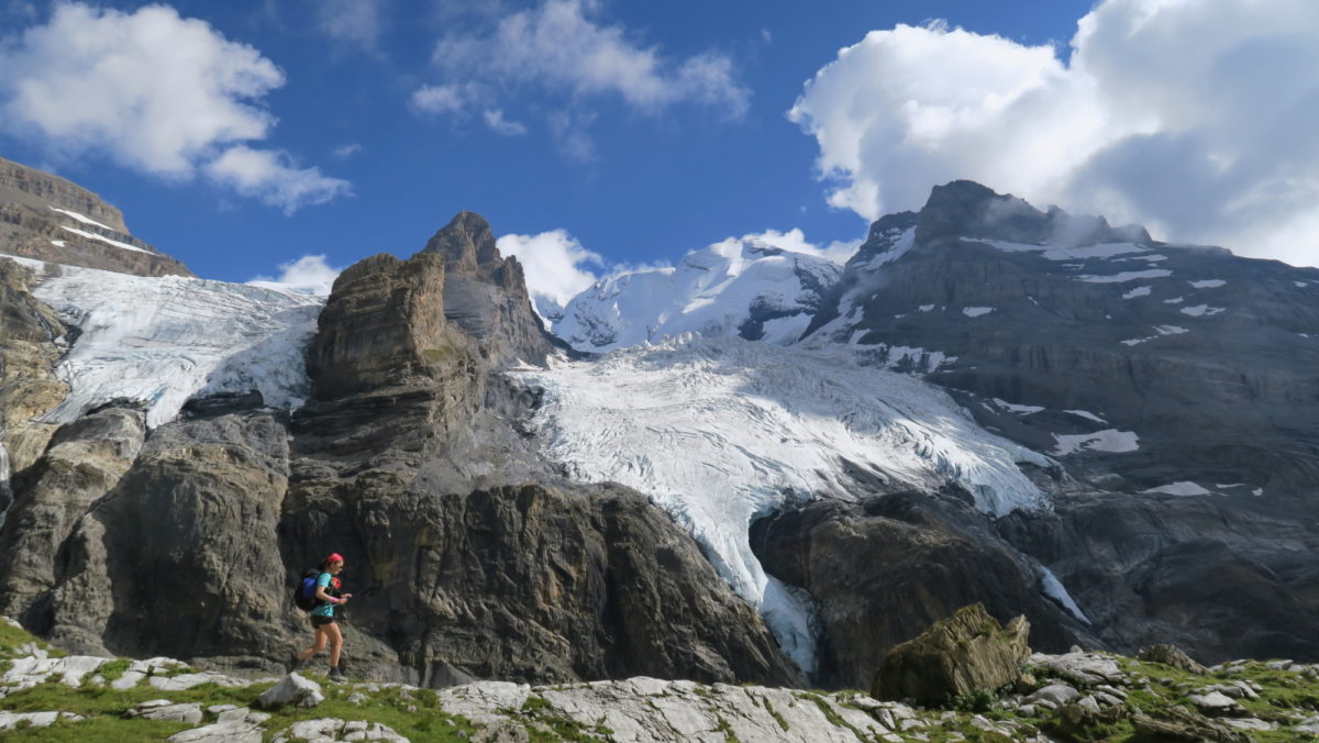 Running along glacial moraine. Alpine Pass Route, Switzerland. (Photo by Chris Councell)