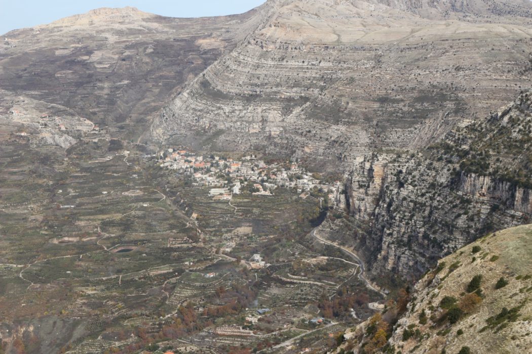 Aaqoura lies tucked up against the escarpment