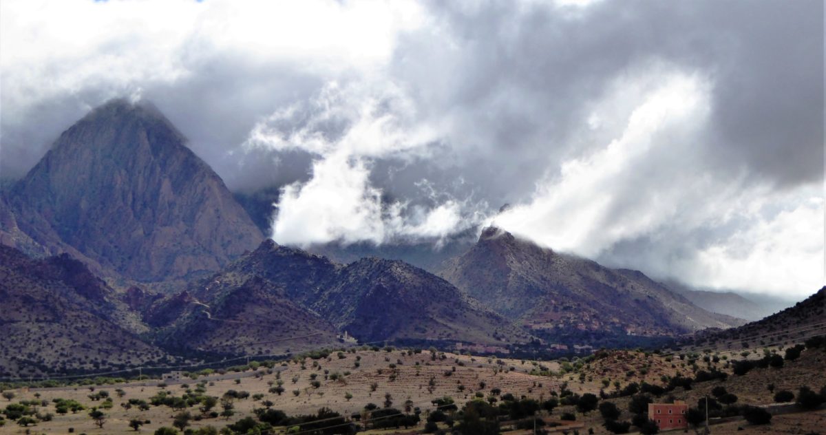 Normally the eastern Ameln Valley - the exit point for the next stage of the Trek - is bathed in sunlight and the summits seem to merge into each other but when the cloud occasionally descends their true stature is dramatically revealed.