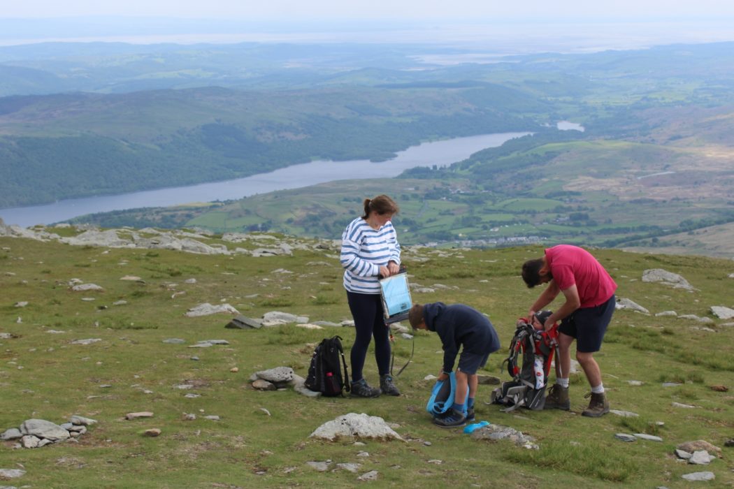 Babies can be remarkably portable. Getting back in the carrier on the summit of the Old Man of Coniston