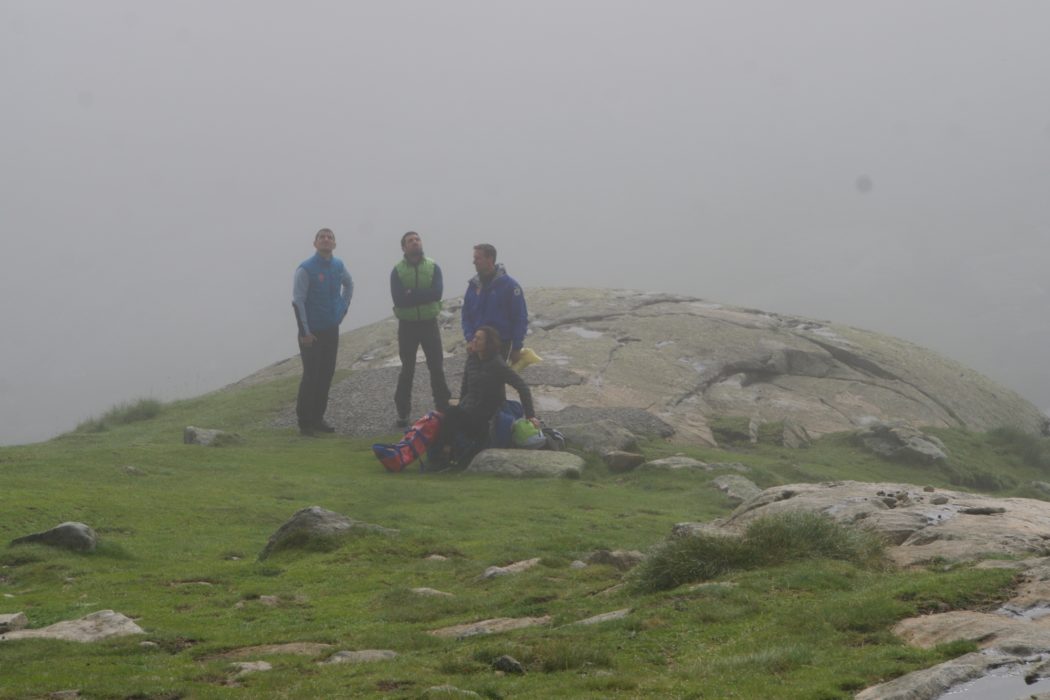 Fruitlessly waiting for an opening in the mist, so the helicopter could land