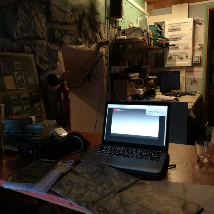 018 My tiny desk amidst satellite phones and electricity boxes