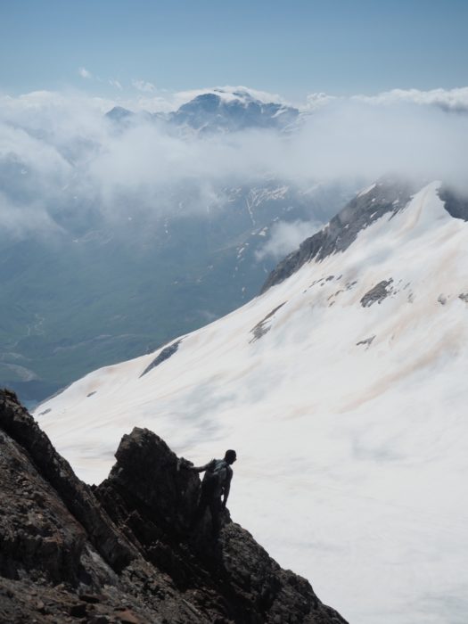 Looking over the edge for signs of the cave