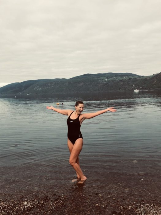 Sarah looking very happy about a wild swim in Loch Ness