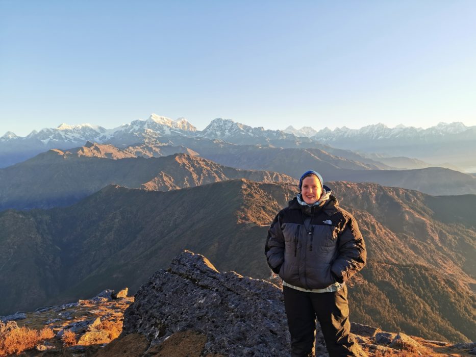 A photo of me and Everest - again trying to smile but it's very cold despite wearing three pairs of trousers and two massive coats!