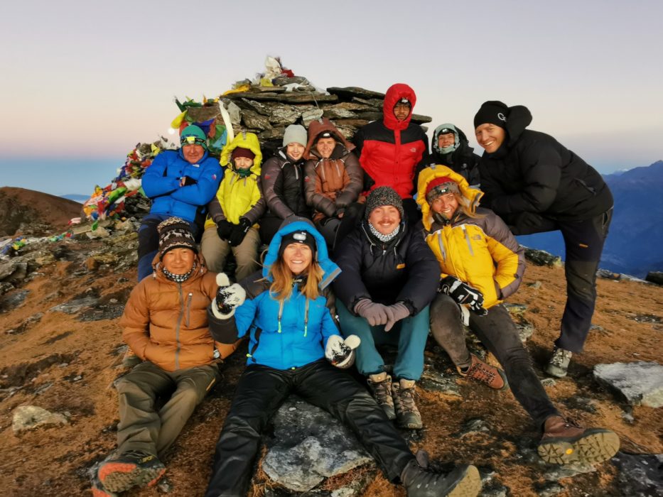 The group - happy and tired and chilly. Abhishek is in the red coat and our sirdar Cshiring Sherpa is in the brown jacket at the front.
