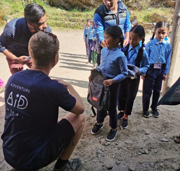 Handing out uniforms