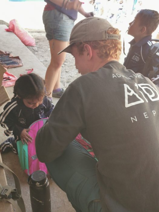 Handing out uniforms