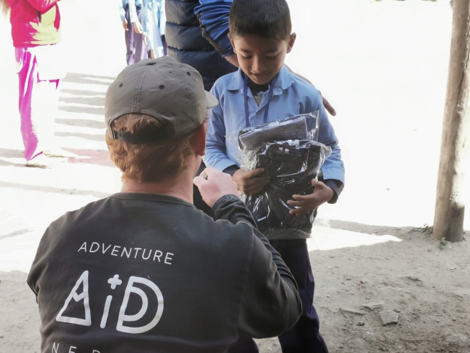 Handing out uniforms
