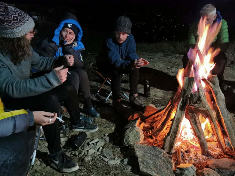 Sitting around the campfire in the evenings