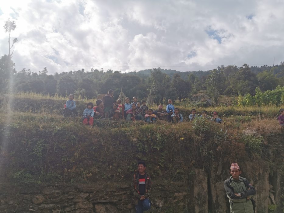 The schoolchildren at Rawa Dolu watching us work from their temporary classroom