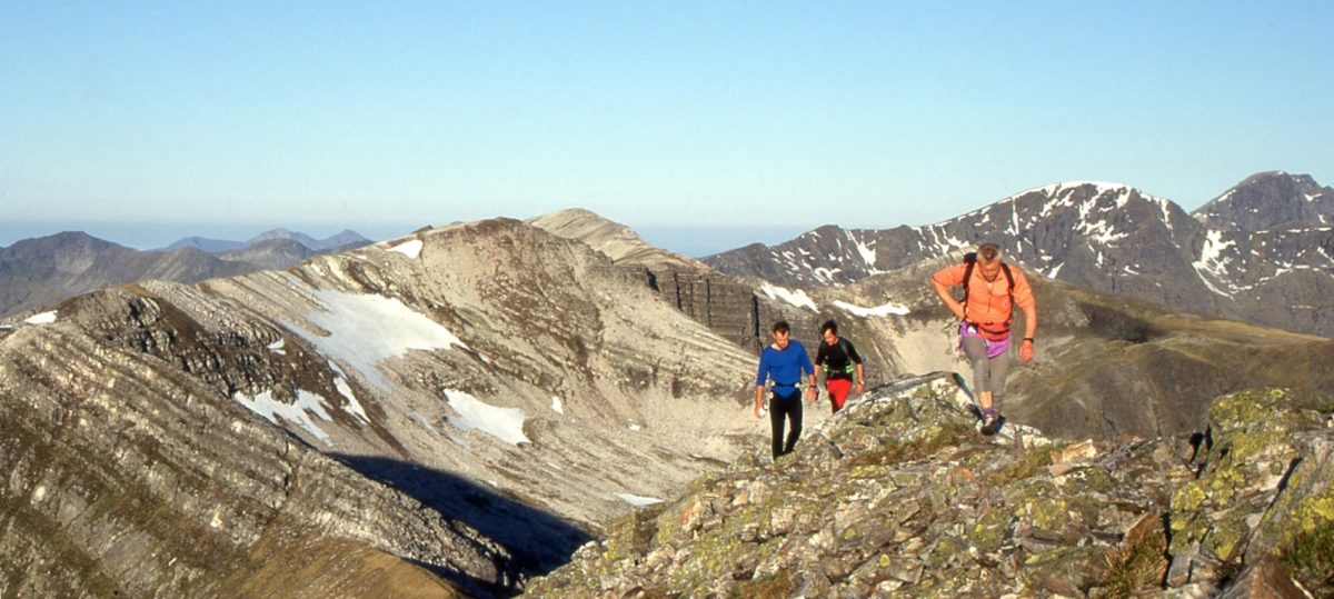 A Ramsays Round Runner And His Supporters On The Grey Corries