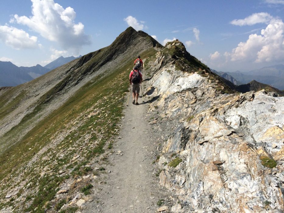 Hikers Crossing The Ridge Easily