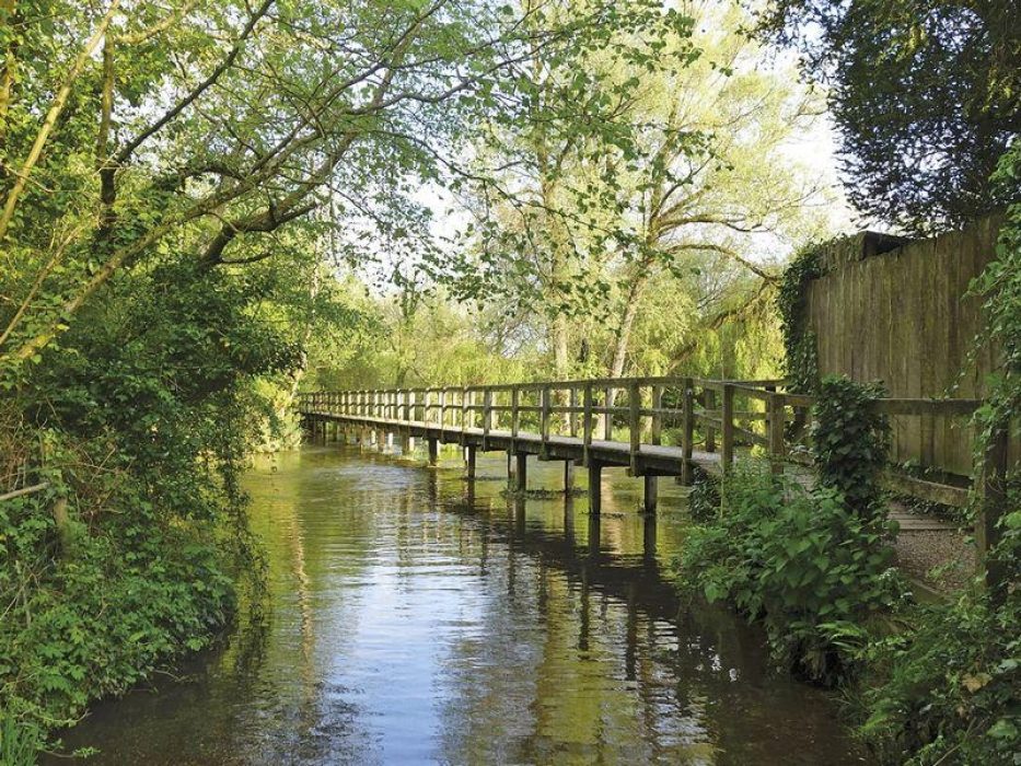 The Test Way offers beautiful scenery and less difficult walking. The long bridge at Wherwell, Test Way