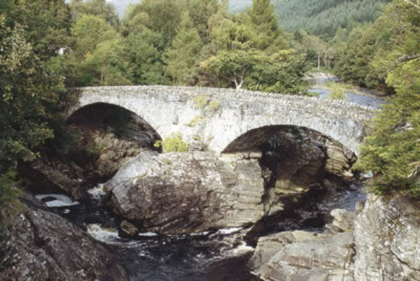 The Old Bridge, or Telford’s Bridge, is slowly crumbling away and can be viewed from the nearby road bridge.