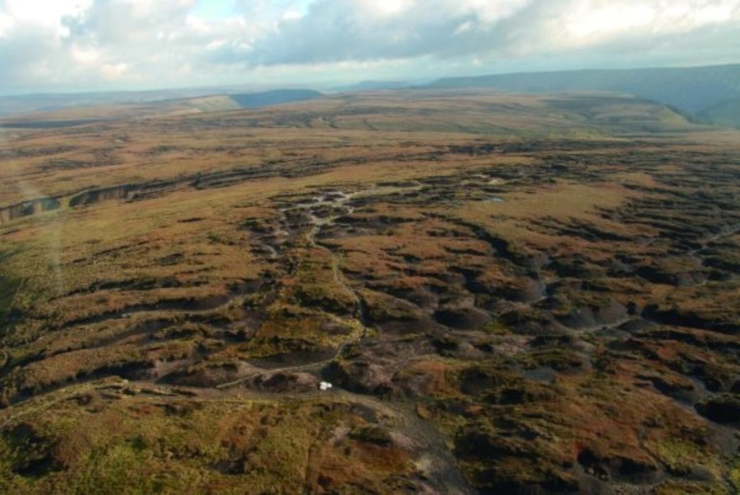 The eroded top of Bleaklow, with the Pennine Way running across the middle. (photo: Moors for the Future Partnership)
