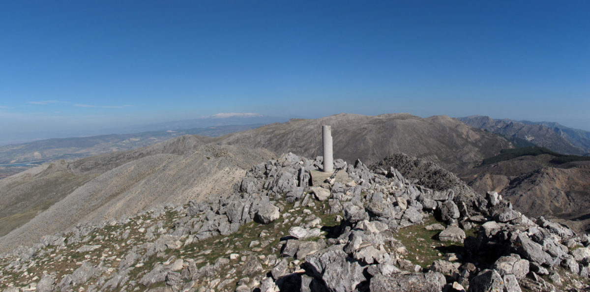 The distant snow-capped Sierra Nevada from the summit of Malascamas