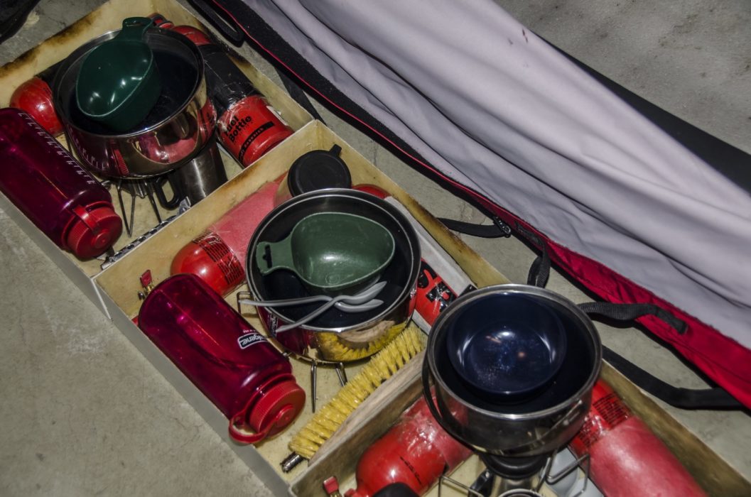 Custom-made kitchen boxes to safely cook in the front portion of the tent.